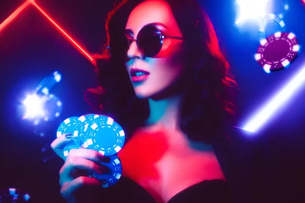 A player using their smartphone during a festive local event, representing ZS777’s fully mobile-friendly casino.